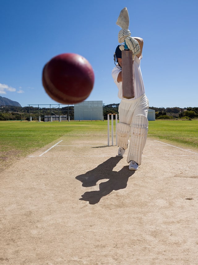 Full length of batsman playing cricket on pitch ; IPL season duckworth lewis system analogy with interview tips