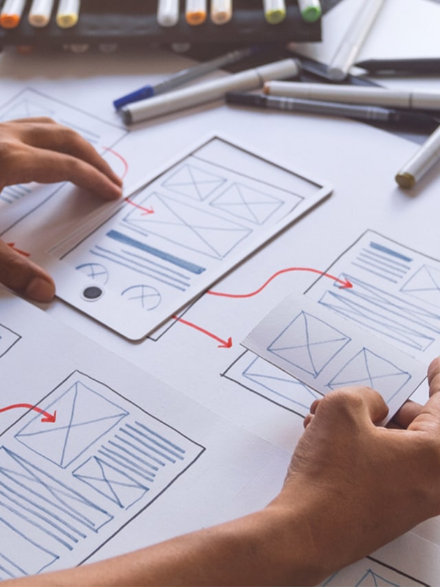 ux Graphic designer creative sketch planning application process development prototype wireframe for web mobile phone . User experience concept; UX designer hiring
