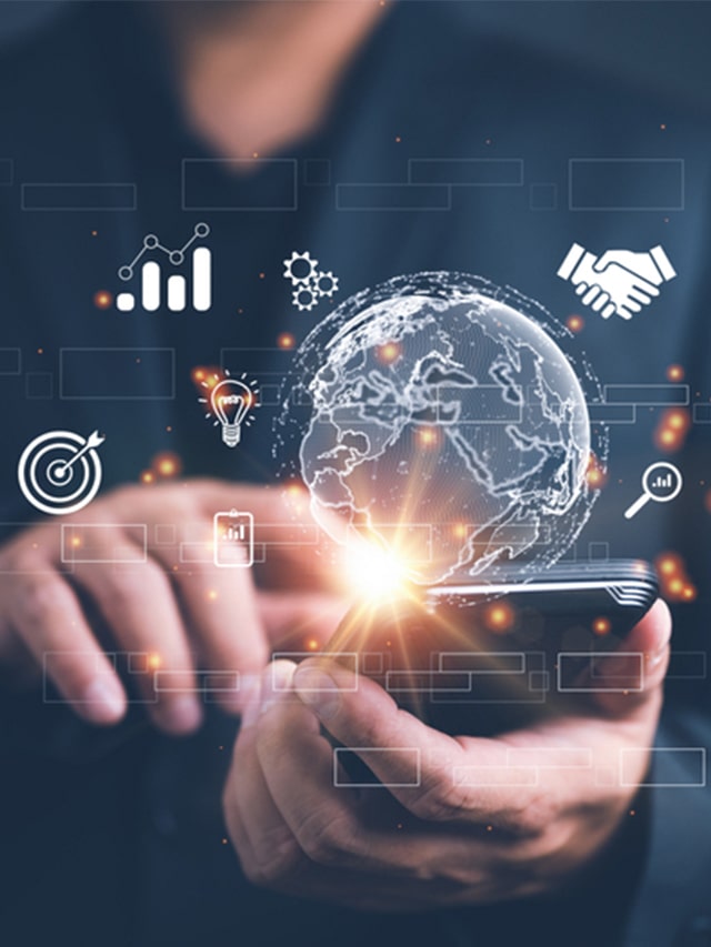 Close up of Businessman using smartphone with icon network. Man hand holding mobile phone for technology; concept of Top Companies Hiring Application Developer in Early July 2024