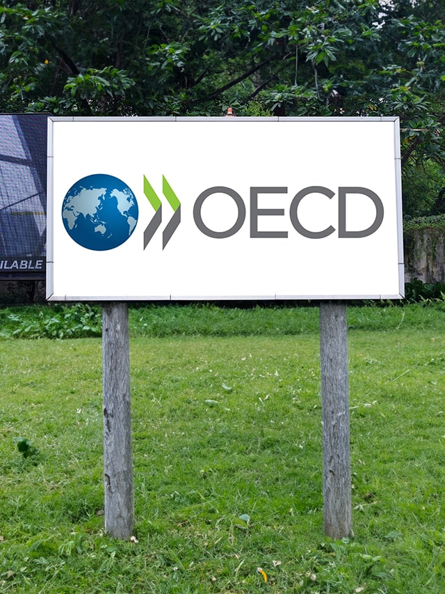 The Organisation for Economic Co-operation and Development (OECD) logo seen on smartphone. Concept OECD Internship Programme 2024