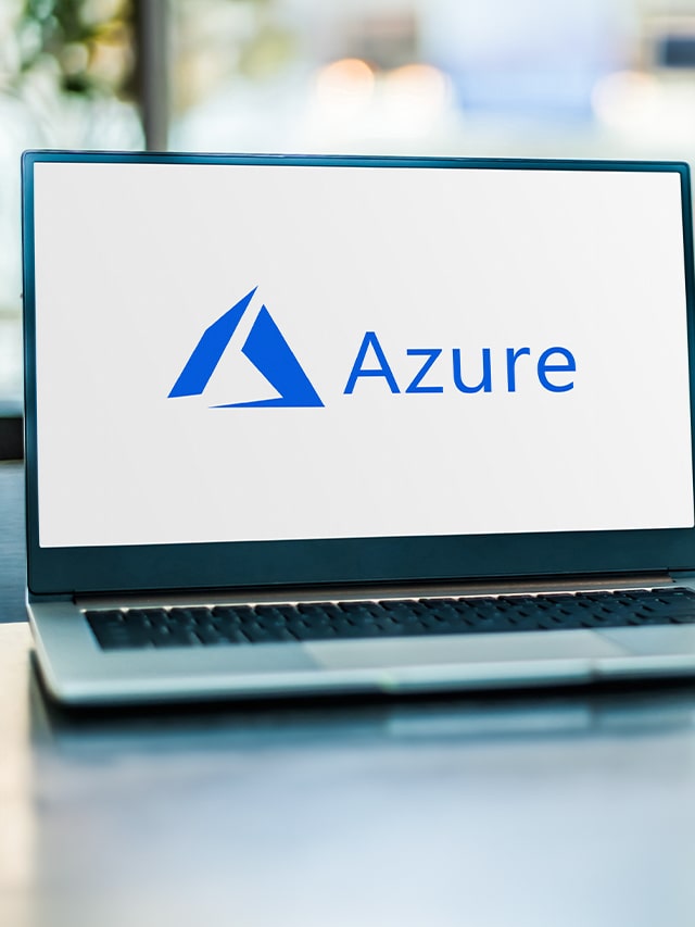 Laptop computer displaying logo of Microsoft Azure, a cloud computing service for building, testing, deploying, and managing applications and services; concept of Most Asked Azure Interview Questions in 2024