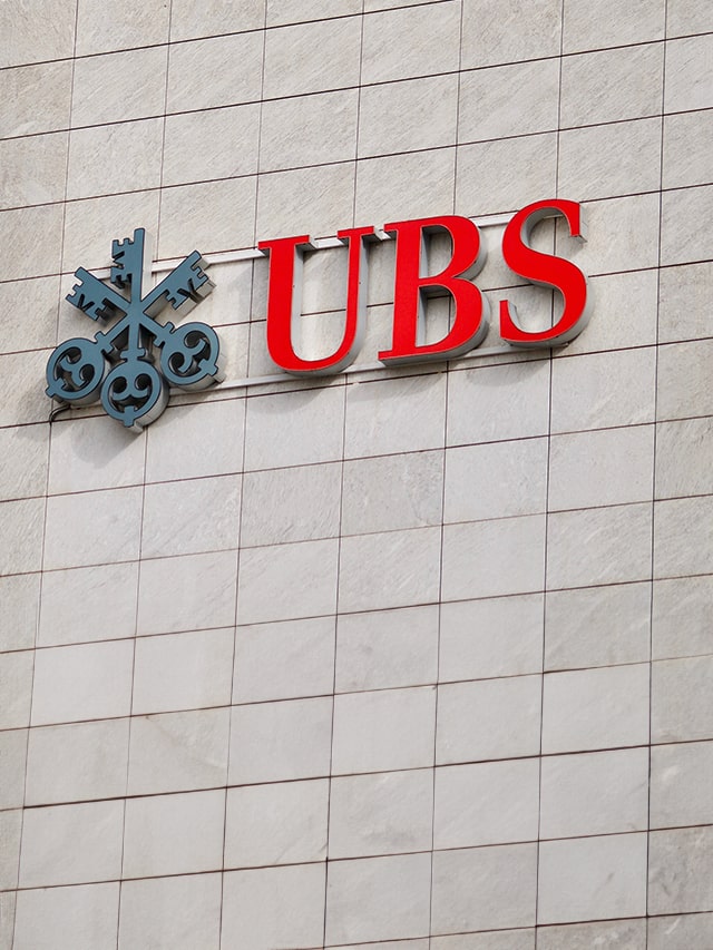 UBS Bank logo sign hanging on a building facade. UBS is one of the leading banks in Switzerland and in the world; concept of UBS Finance Paid Internship 2024