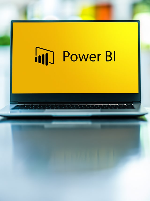 Laptop computer displaying logo of Power BI, a business analytics service by Microsoft; concept of Most Asked Power BI Interview Questions in 2024